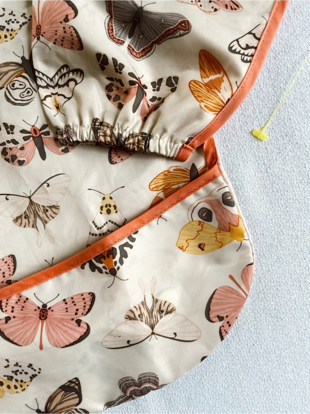 TINY TWINKLE Tiny Twinkle Mess Long Sleeve Bib Apron Art Food Butterfly Moth